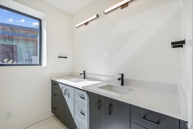 3035 Corral Peak Cir Unit 148, Heber City, UT 84032 - bathroom featuring double vanity and baseboards