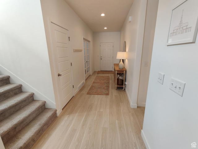2132 N Elderberry Dr W, Saratoga Springs, UT 84045 - hall with light wood-style flooring, recessed lighting, baseboards, and stairway