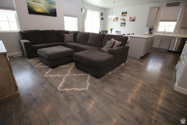 1457 W 400 S, Syracuse, UT 84075 - living area with dark wood-style flooring and a chandelier