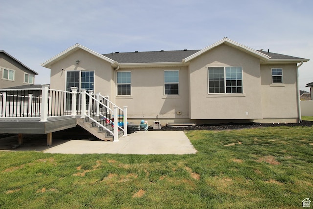 1457 W 400 S, Syracuse, UT 84075 - back of house with a patio, stucco siding, a wooden deck, and a lawn