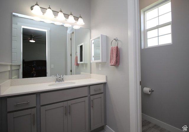 1457 W 400 S, Syracuse, UT 84075 - bathroom with vanity, baseboards, and ceiling fan