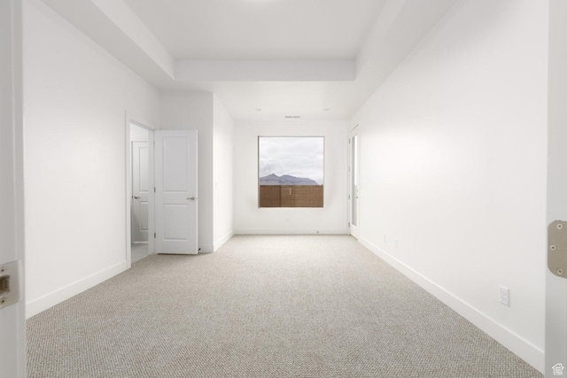 1517 W 470 N Unit 53, Hurricane, UT 84737 - empty room featuring light carpet, baseboards, and a tray ceiling