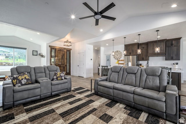 19722 Elkhorn Cir, Birdseye, UT 84629 - living area with vaulted ceiling, ceiling fan, light wood-type flooring, a chandelier, and recessed lighting