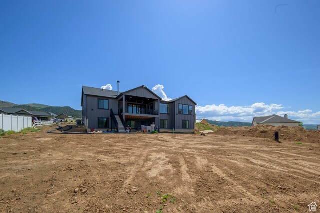 19722 Elkhorn Cir, Birdseye, UT 84629 - rear view of house featuring stairway