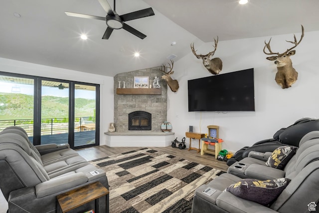 19722 Elkhorn Cir, Birdseye, UT 84629 - living area with a ceiling fan, vaulted ceiling, wood finished floors, a stone fireplace, and recessed lighting