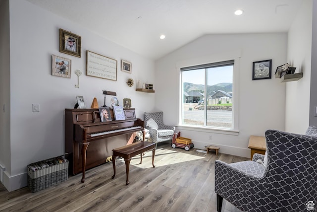 19722 Elkhorn Cir, Birdseye, UT 84629 - sitting room with wood finished floors, vaulted ceiling, recessed lighting, and baseboards