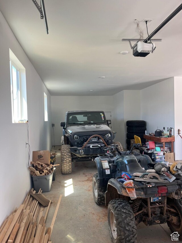 19722 Elkhorn Cir, Birdseye, UT 84629 - garage featuring a garage door opener