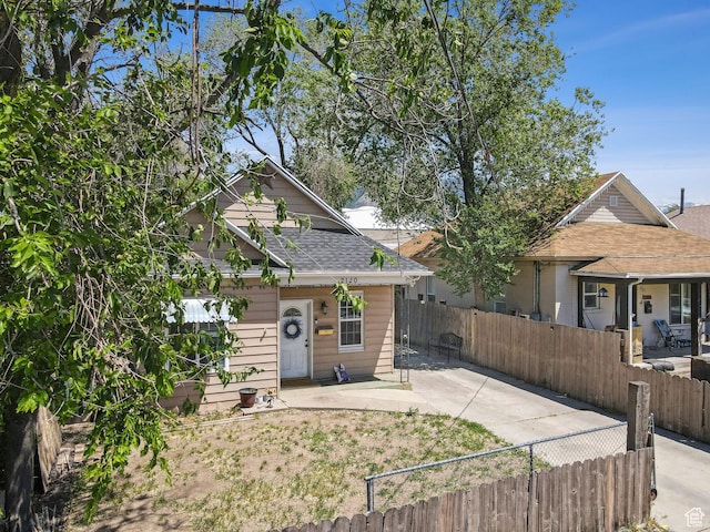 2120 Pingree Ave, Ogden, UT 84401 - bungalow with a shingled roof and a patio area