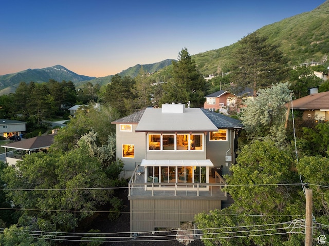 4774 S Oak Terrace Dr, Millcreek, UT 84124 - back of property at dusk featuring a mountain view