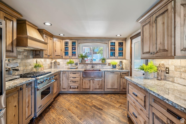 4774 S Oak Terrace Dr, Millcreek, UT 84124 - kitchen featuring a sink, stainless steel range, wall chimney exhaust hood, backsplash, and recessed lighting