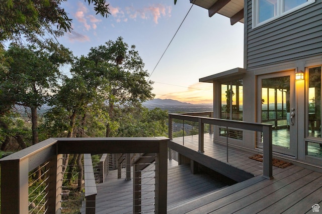 4774 S Oak Terrace Dr, Millcreek, UT 84124 - deck at dusk featuring a mountain view
