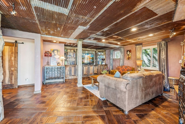4774 S Oak Terrace Dr, Millcreek, UT 84124 - living area with ornate columns, a barn door, recessed lighting, and baseboards