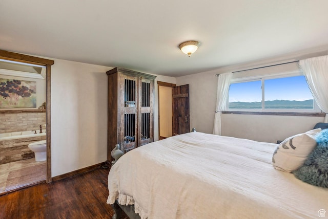 4774 S Oak Terrace Dr, Millcreek, UT 84124 - bedroom featuring dark wood-style flooring, baseboards, and ensuite bathroom