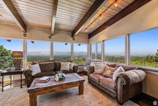 4774 S Oak Terrace Dr, Millcreek, UT 84124 - sunroom / solarium with track lighting, wooden ceiling with exposed beams, wood finished floors, and a mountain view