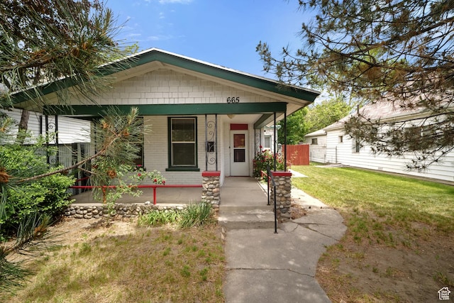665 S Emery St W, Salt Lake City, UT 84104 - view of front of house with covered porch