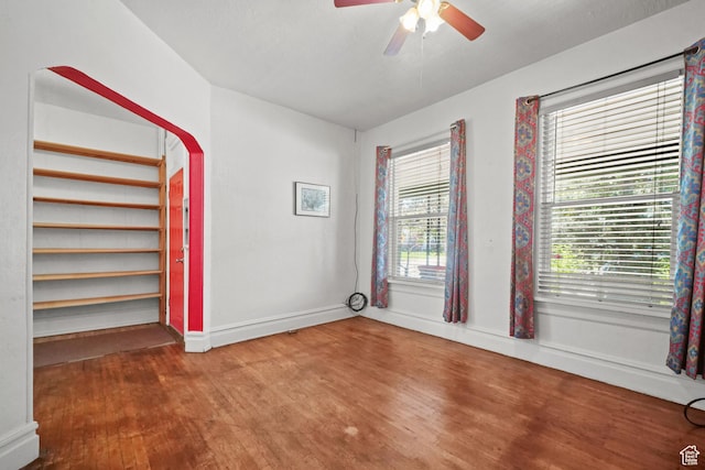 665 S Emery St W, Salt Lake City, UT 84104 - unfurnished room featuring wood finished floors, ceiling fan, and baseboards