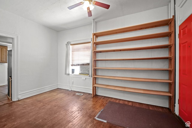 665 S Emery St W, Salt Lake City, UT 84104 - unfurnished bedroom featuring wood finished floors, ceiling fan, and baseboards