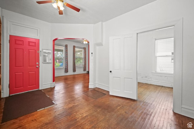 665 S Emery St W, Salt Lake City, UT 84104 - foyer entrance with ceiling fan, hardwood / wood-style floors, arched walkways, and baseboards