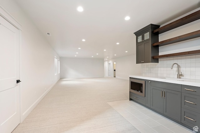 487 W 1200 N, Mapleton, UT 84664 - kitchen featuring a sink, stainless steel microwave, open shelves, recessed lighting, and light countertops