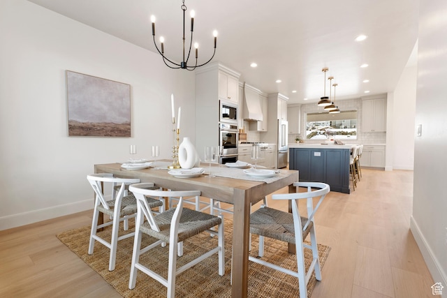 487 W 1200 N, Mapleton, UT 84664 - dining area featuring light wood-type flooring, baseboards, recessed lighting, and a chandelier