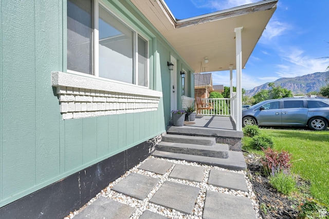 2883 S Brinker Ave E, Ogden, UT 84403 - property entrance with a mountain view and covered porch