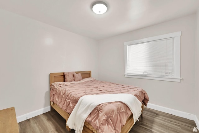 2883 S Brinker Ave E, Ogden, UT 84403 - bedroom with baseboards and wood finished floors