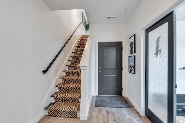 6439 W S Jordan Pkwy, South Jordan, UT 84009 - stairway with wood finished floors and baseboards
