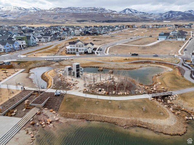 6439 W S Jordan Pkwy, South Jordan, UT 84009 - aerial view of property's location with nearby suburban area and a water and mountain view