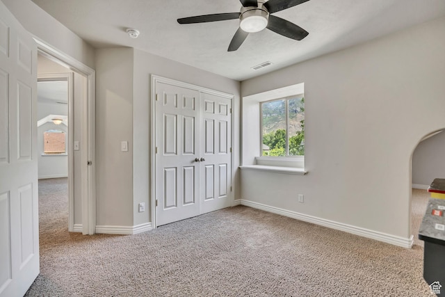 1162 E 1180 N, American Fork, UT 84003 - unfurnished bedroom with carpet floors, a closet, arched walkways, and baseboards