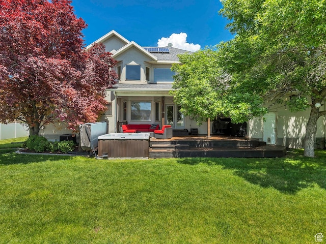 1162 E 1180 N, American Fork, UT 84003 - view of front of house featuring a hot tub, roof mounted solar panels, a front yard, and a shingled roof