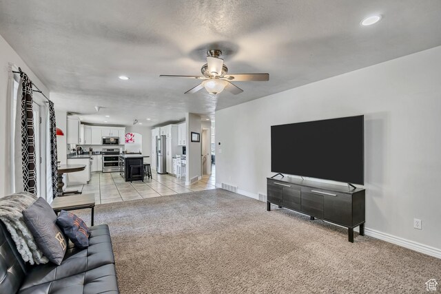 1162 E 1180 N, American Fork, UT 84003 - living room featuring ceiling fan, baseboards, light colored carpet, and recessed lighting