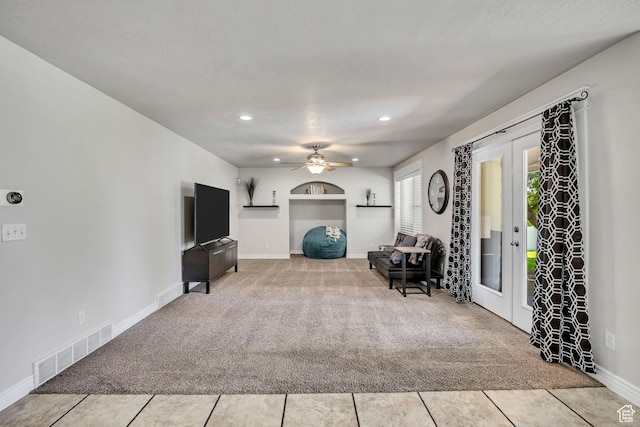 1162 E 1180 N, American Fork, UT 84003 - carpeted living room with french doors, ceiling fan, recessed lighting, baseboards, and tile patterned flooring