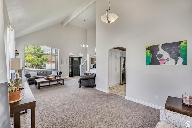 1162 E 1180 N, American Fork, UT 84003 - living area with carpet flooring, high vaulted ceiling, arched walkways, beam ceiling, and stairs
