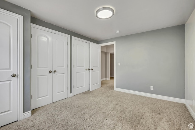 1162 E 1180 N, American Fork, UT 84003 - unfurnished bedroom with two closets, carpet, and baseboards