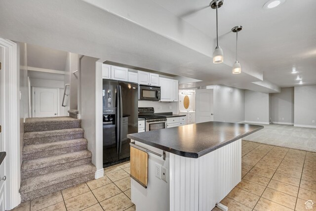 1162 E 1180 N, American Fork, UT 84003 - kitchen with black appliances, light tile patterned floors, dark countertops, open floor plan, and white cabinetry