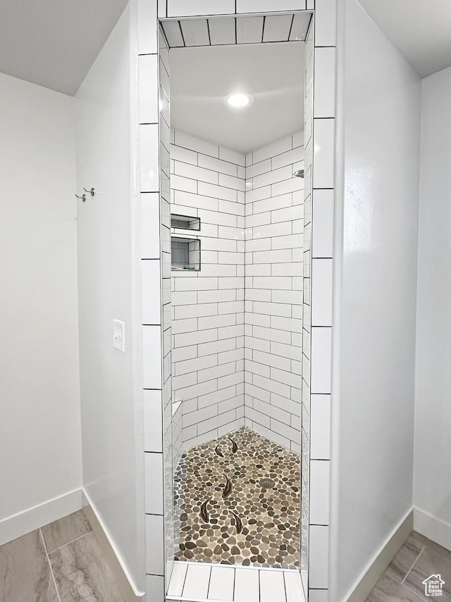 1005 S Valley View Ct, Moab, UT 84532 - full bathroom with a shower stall and baseboards