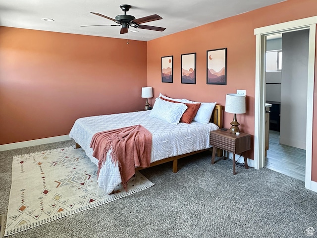 1005 S Valley View Ct, Moab, UT 84532 - carpeted bedroom featuring baseboards and ceiling fan