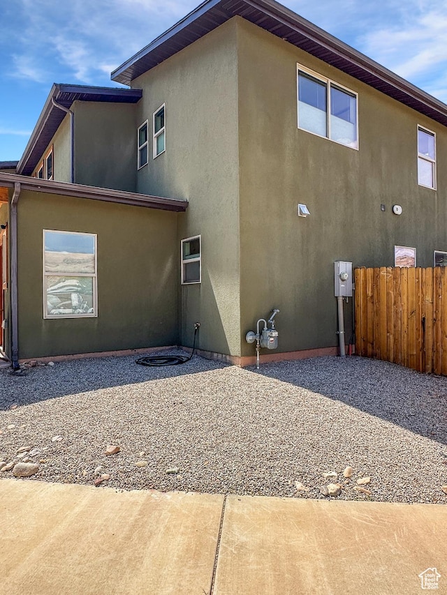 1005 S Valley View Ct, Moab, UT 84532 - rear view of property with stucco siding