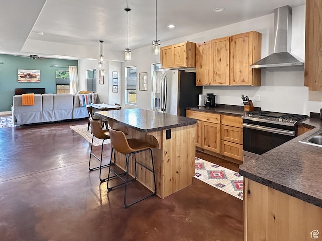 1005 S Valley View Ct, Moab, UT 84532 - kitchen featuring wall chimney exhaust hood, stainless steel appliances, finished concrete flooring, dark countertops, and recessed lighting