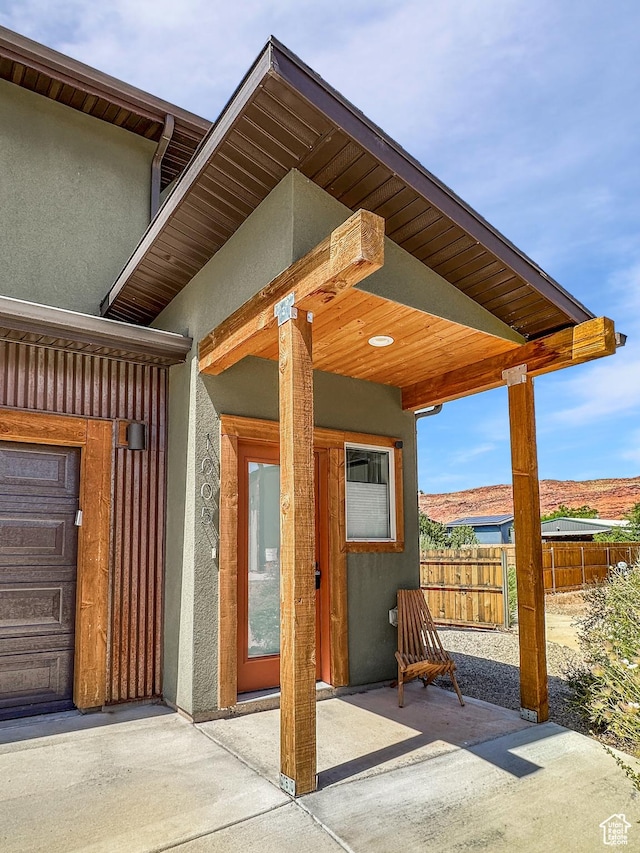 1005 S Valley View Ct, Moab, UT 84532 - entrance to property featuring stucco siding and a patio area