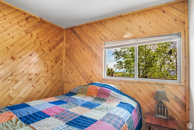 1235 Lakeview Dr, Garden City, UT 84028 - bedroom featuring multiple windows and wooden walls
