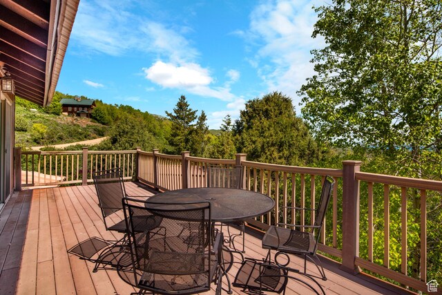 1235 Lakeview Dr, Garden City, UT 84028 - wooden deck with outdoor dining area