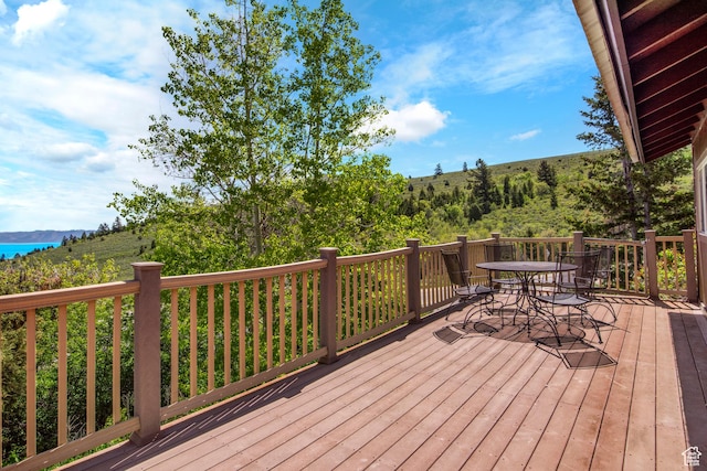 1235 Lakeview Dr, Garden City, UT 84028 - wooden deck with outdoor dining area