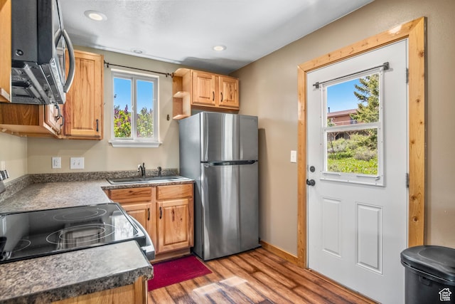 1235 Lakeview Dr, Garden City, UT 84028 - kitchen featuring freestanding refrigerator, a sink, light wood-style floors, electric stove, and recessed lighting