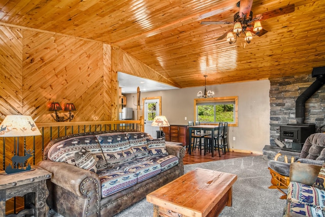 1235 Lakeview Dr, Garden City, UT 84028 - living area with a ceiling fan, a wood stove, carpet flooring, lofted ceiling, and wood ceiling