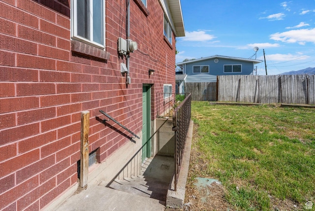 672 Nelson Ave, Tooele, UT 84074 - view of home's exterior featuring brick siding