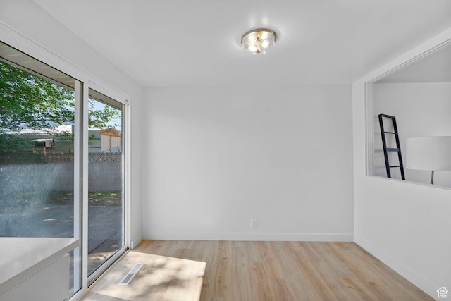 672 Nelson Ave, Tooele, UT 84074 - empty room with light wood-style flooring and baseboards