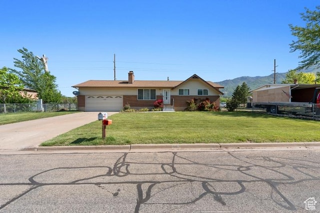 1460 Canyon Dr, South Weber, UT 84405 - single story home featuring driveway, a garage, a chimney, and a mountain view