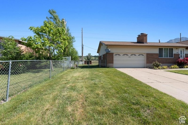 1460 Canyon Dr, South Weber, UT 84405 - view of yard with a garage and driveway