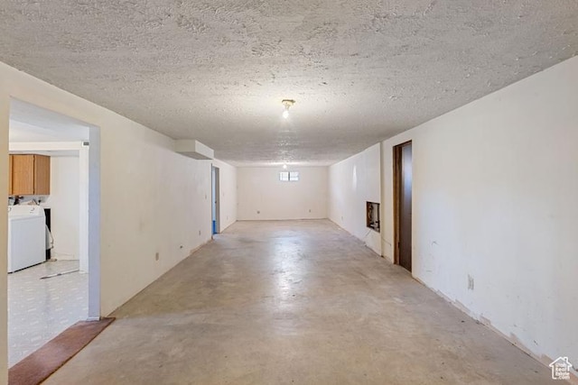 1460 Canyon Dr, South Weber, UT 84405 - empty room with washer / clothes dryer, concrete floors, and a textured ceiling